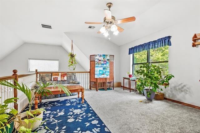 recreation room featuring ceiling fan, carpet floors, and lofted ceiling