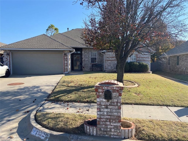 ranch-style home with a garage and a front yard