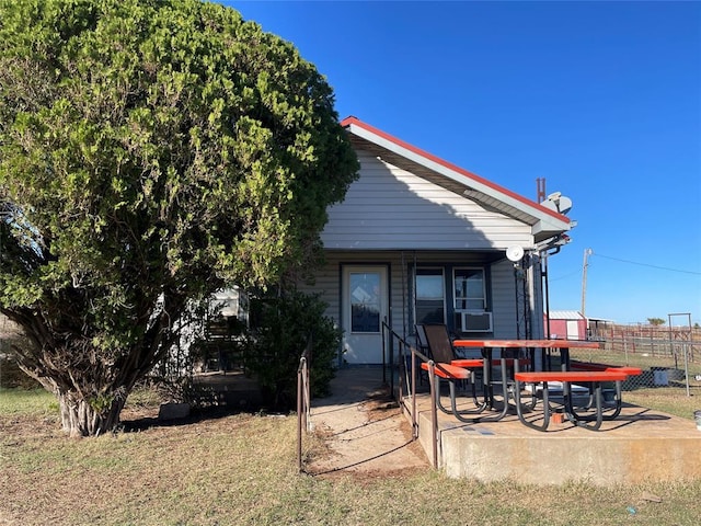 rear view of property with a patio area