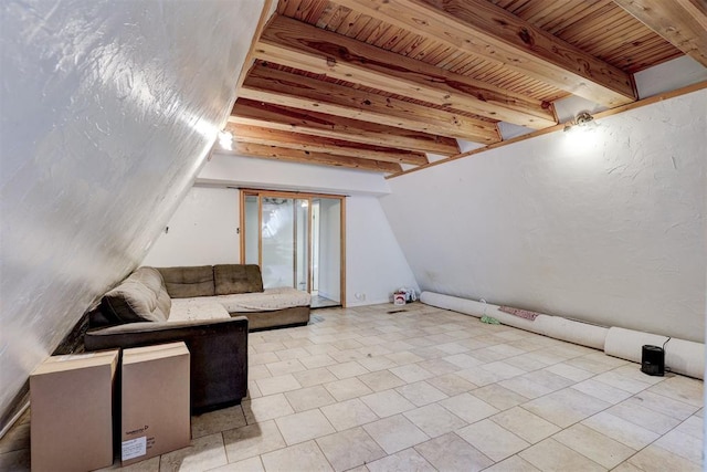 living room featuring beam ceiling and wooden ceiling