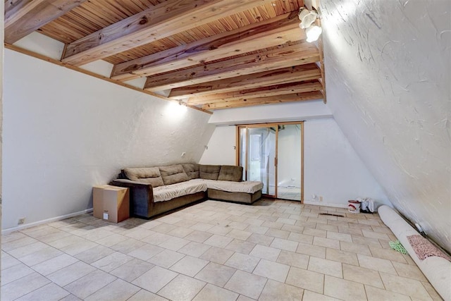 unfurnished living room with beam ceiling, light tile patterned floors, and wood ceiling