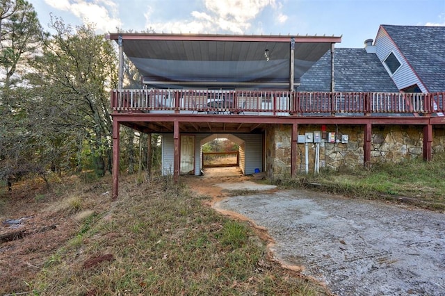 rear view of house with a deck