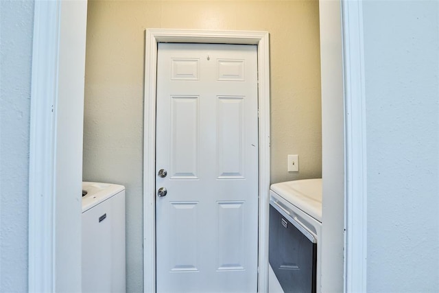 laundry area featuring independent washer and dryer