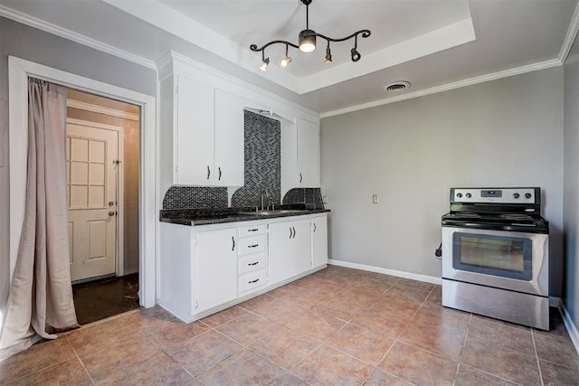 kitchen with decorative backsplash, white cabinets, a raised ceiling, and stainless steel electric stove