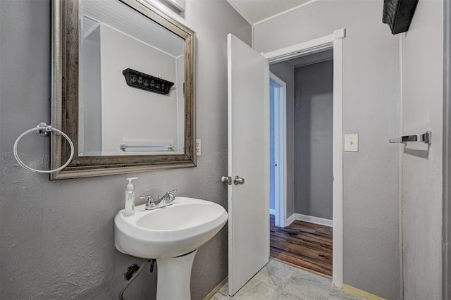 bathroom featuring hardwood / wood-style flooring and sink