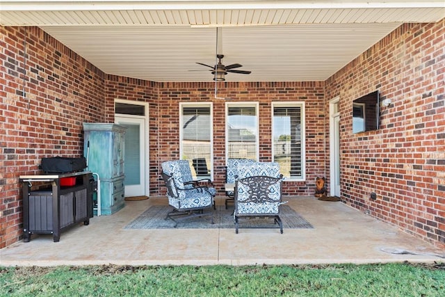 view of patio / terrace featuring ceiling fan