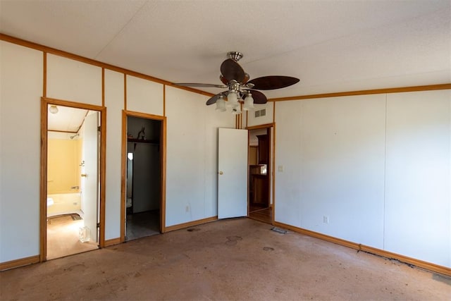 unfurnished bedroom with ensuite bath, ceiling fan, and crown molding