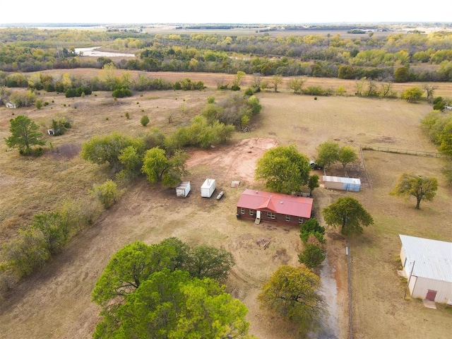 birds eye view of property with a rural view