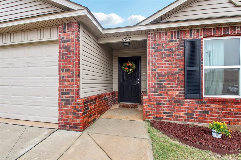 entrance to property featuring a garage