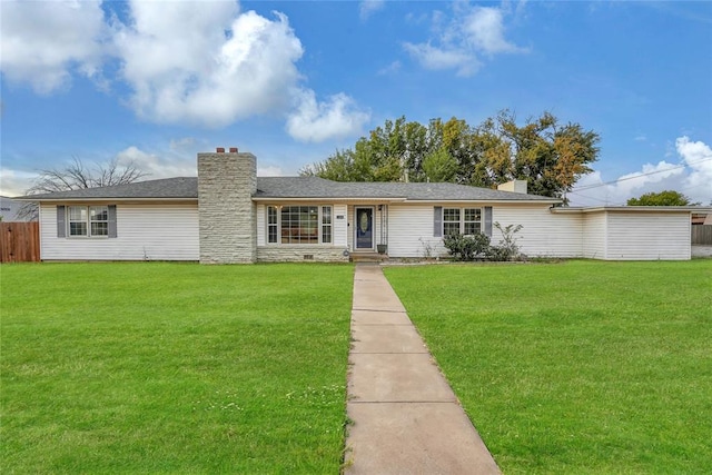 ranch-style house with a front yard