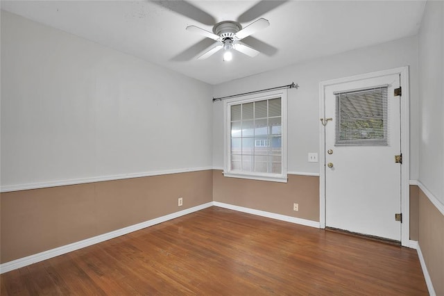 unfurnished room featuring hardwood / wood-style flooring and ceiling fan