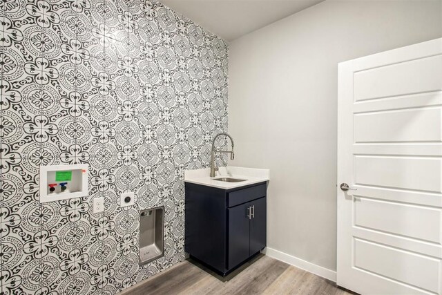 2200 El Cajon St, Edmond, OK 73034 - bathroom featuring wood finished floors and vanity