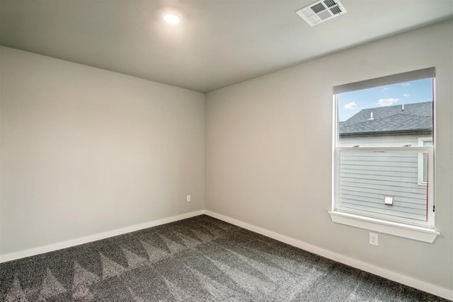 2200 El Cajon St, Edmond, OK 73034 - carpeted spare room featuring baseboards