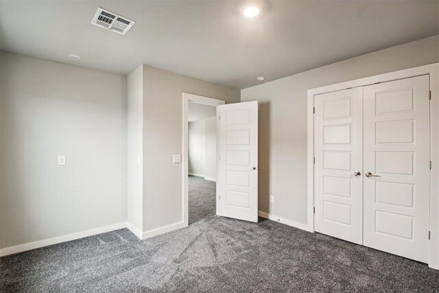 2200 El Cajon St, Edmond, OK 73034 - unfurnished bedroom featuring carpet flooring and a closet