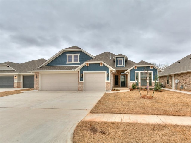 craftsman house with a garage