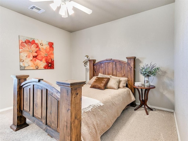 bedroom featuring light colored carpet and ceiling fan