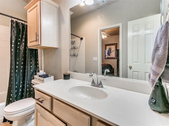 full bathroom featuring vanity, toilet, and shower / bath combo with shower curtain