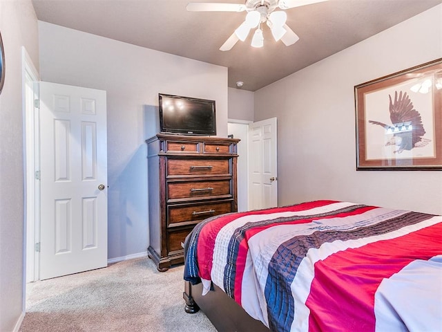 bedroom with light colored carpet and ceiling fan