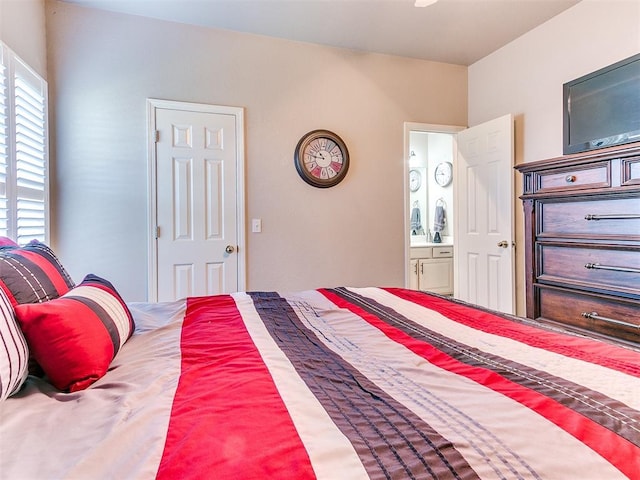 bedroom featuring ensuite bath