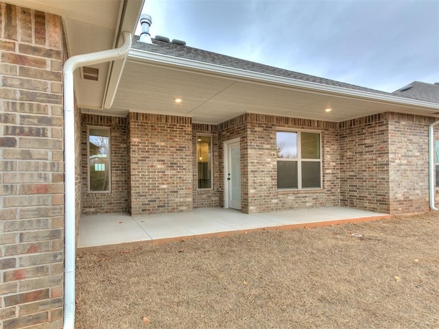 rear view of house with a patio area