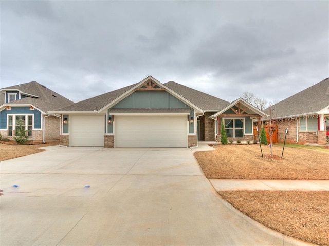 craftsman house with a garage