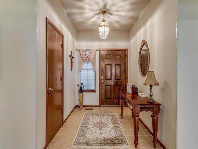 view of tiled foyer entrance