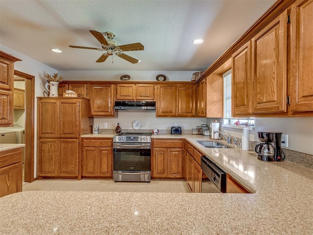 kitchen featuring ceiling fan, sink, and stainless steel appliances