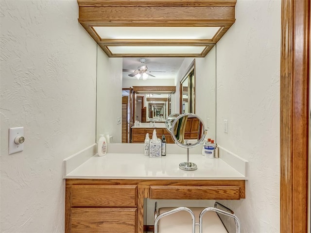 bathroom with vanity and ceiling fan