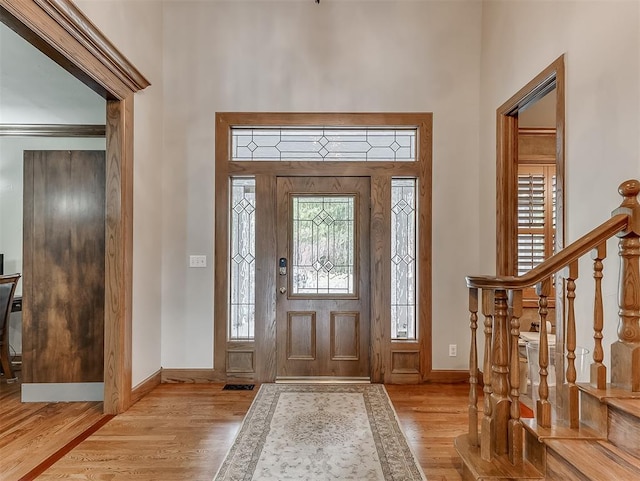 entrance foyer with light wood-type flooring