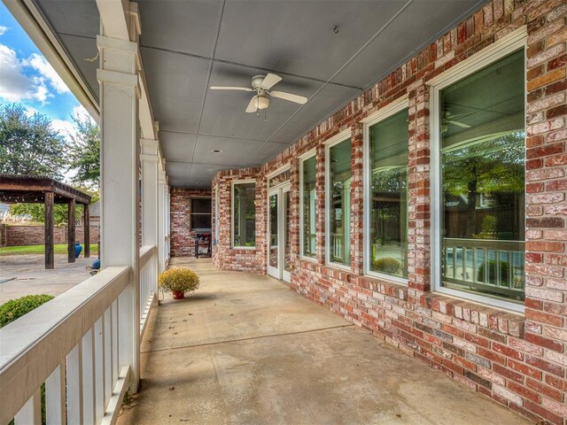 view of patio / terrace featuring ceiling fan and covered porch