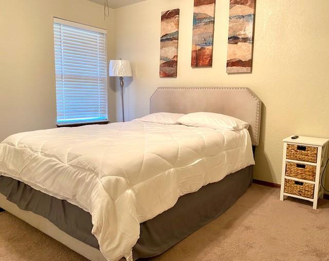 bedroom featuring carpet floors