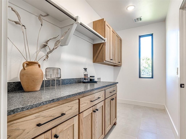 kitchen featuring light tile patterned floors