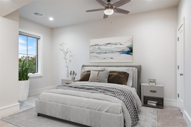 carpeted bedroom featuring ceiling fan