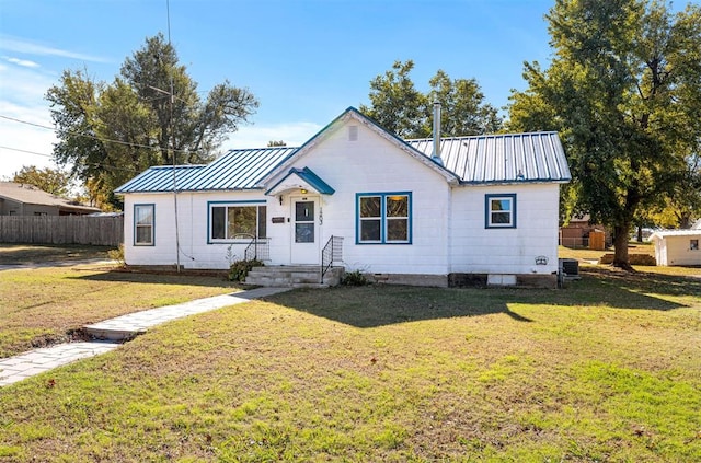 view of front of property with a front lawn