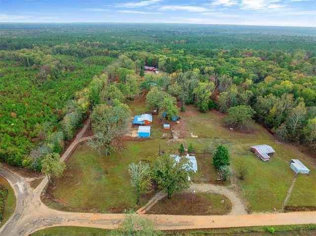 drone / aerial view with a view of trees