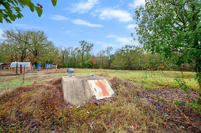 entry to storm shelter with fence