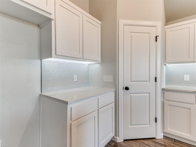 interior space with hardwood / wood-style flooring