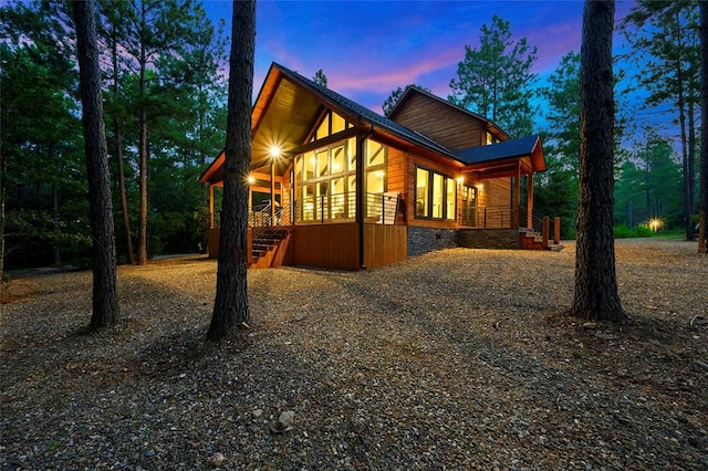 view of property exterior at dusk