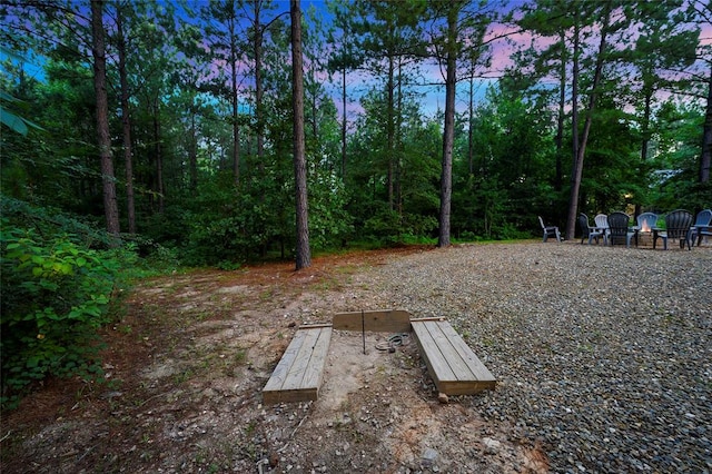 view of yard at dusk