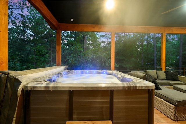 119 Secluded Cir, Broken Bow, OK 74728 - sunroom / solarium with a jacuzzi and an outdoor hangout area