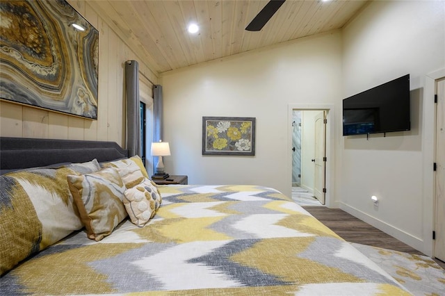 bedroom featuring hardwood / wood-style flooring, ceiling fan, lofted ceiling, and wooden ceiling