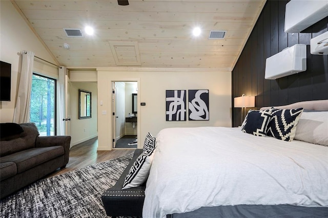 bedroom featuring ensuite bath, wood walls, lofted ceiling, wood ceiling, and hardwood / wood-style flooring