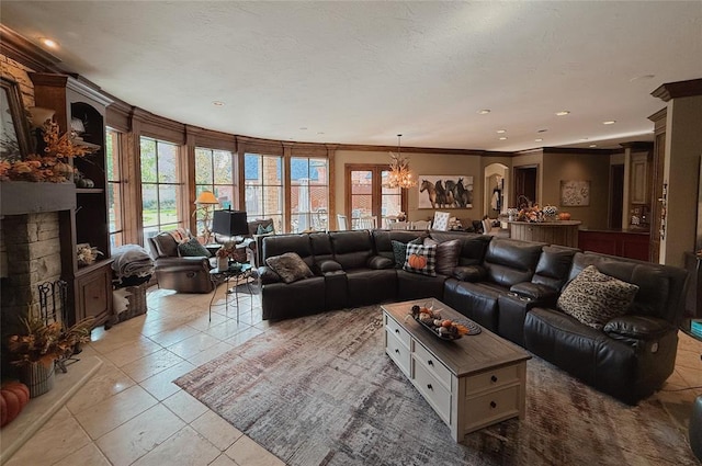 living room featuring crown molding, a fireplace, light tile patterned floors, and a notable chandelier