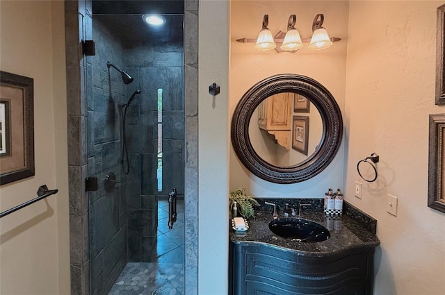 bathroom with vanity and an enclosed shower