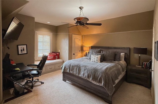 bedroom featuring light colored carpet, ceiling fan, and lofted ceiling