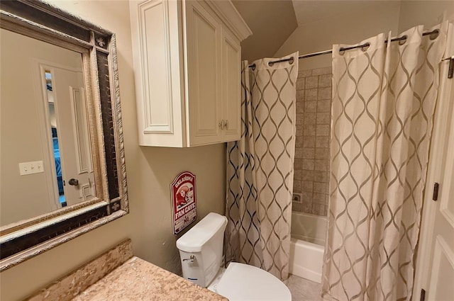 full bathroom featuring vanity, vaulted ceiling, toilet, and shower / bathtub combination with curtain