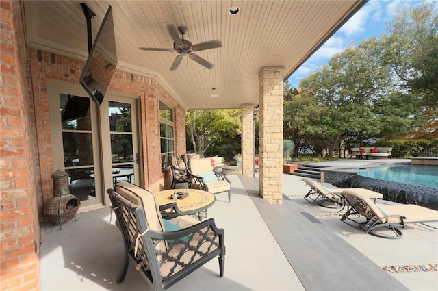 view of patio / terrace featuring ceiling fan