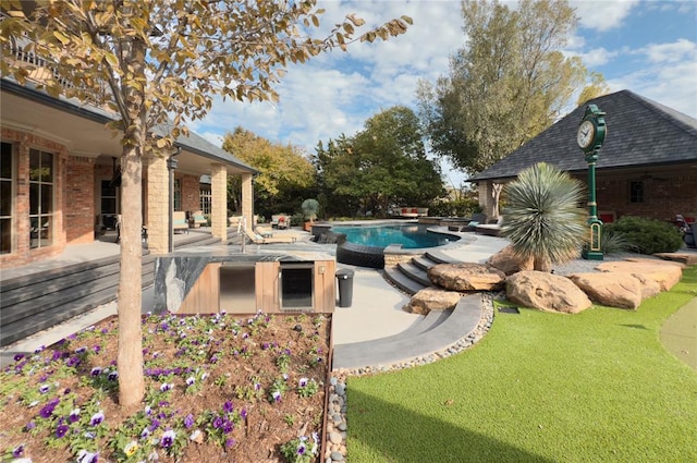 view of swimming pool featuring a patio