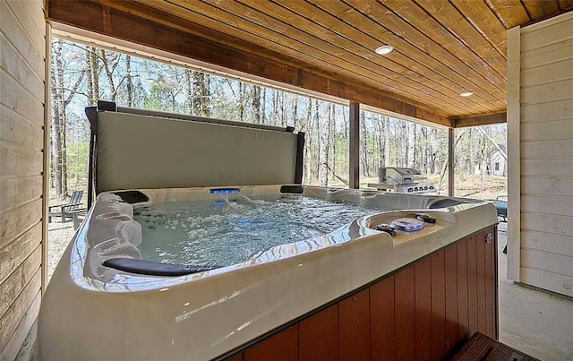 view of patio / terrace featuring a hot tub