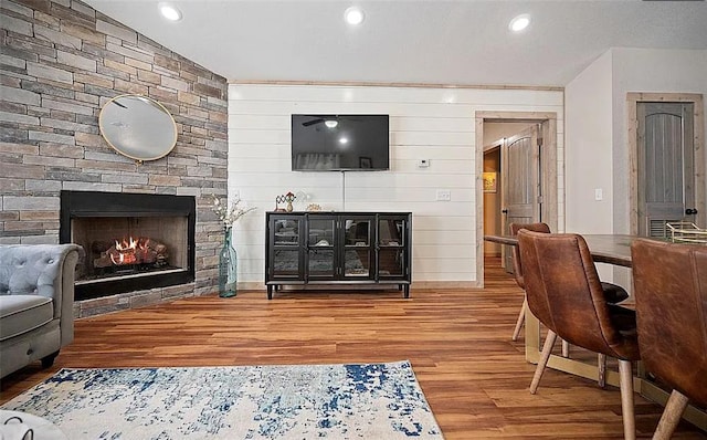 living room featuring hardwood / wood-style floors and a fireplace